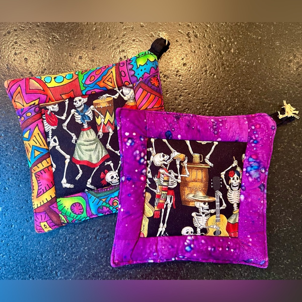 Day of the Dead pot holders.
